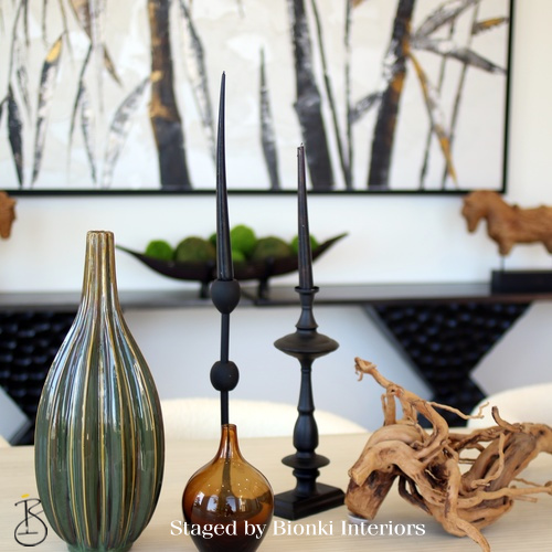 Curated accessory styling for luxury home staging, featuring layered decor, natural textures, and refined details that elevate the overall presentation of the home. Styled by Bionki Interiors.